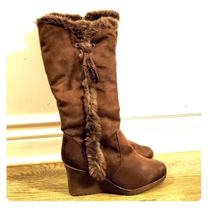 Tall fur lined brown boots with heel